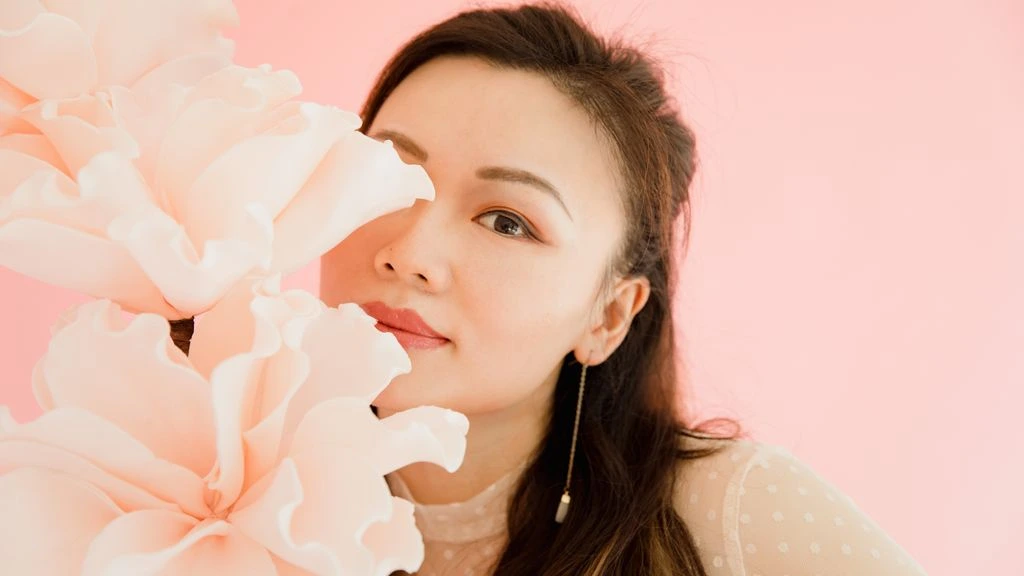 Portrait of Dr. Amara Lin, founder of Tao of Venus